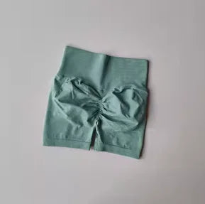 Pêssego hip levantamento esportes shorts feminino cintura alta e aperto de cintura emagrecimento correndo hip velocidade secagem três pontos calças apertadas